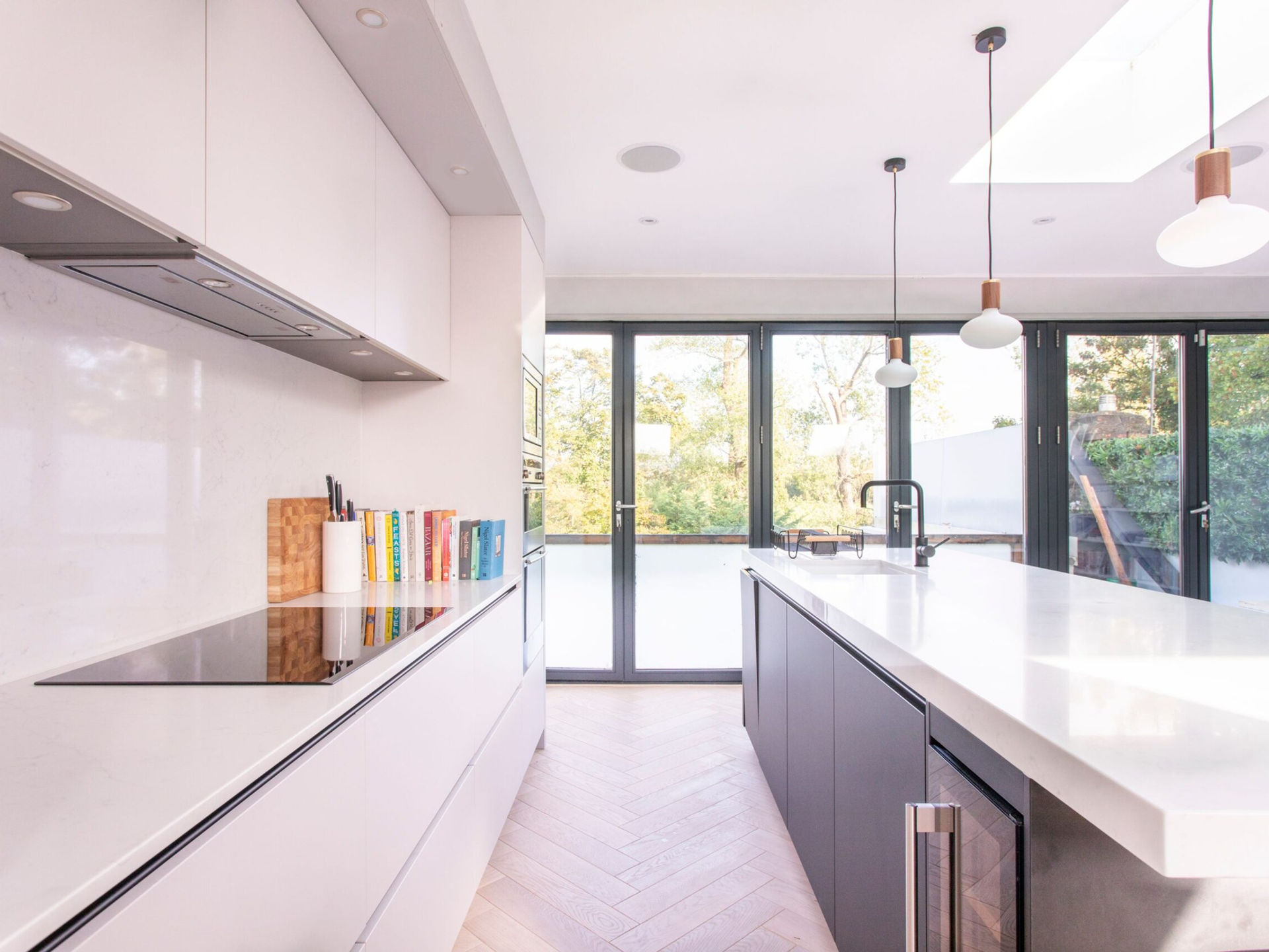 Bright renovated London kitchen with glass gable